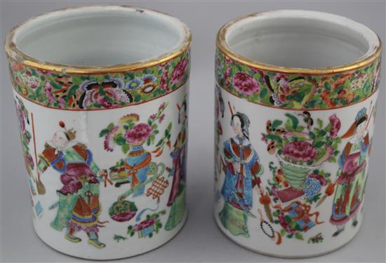 A pair of Chinese Canton-decorated famille rose brush pots, Daoguang period, 16cm, one cracked